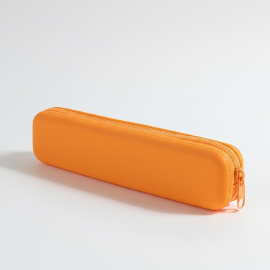 Bright Orange slim silicone makeup bag on a white background