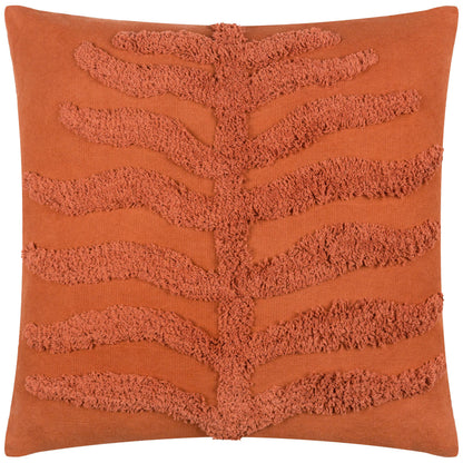 Orange boho tufted cushion with textured leaf design on a white background