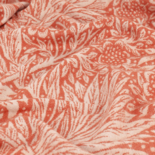 Close up of Marigold William Morris throw featuring a traditional foliage jacquard weave on soft faux mohair fabric.