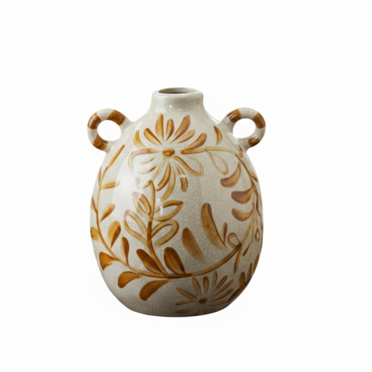 Double-handled ceramic vase with a hand-painted ochre floral design and white crackle glaze on a white background 