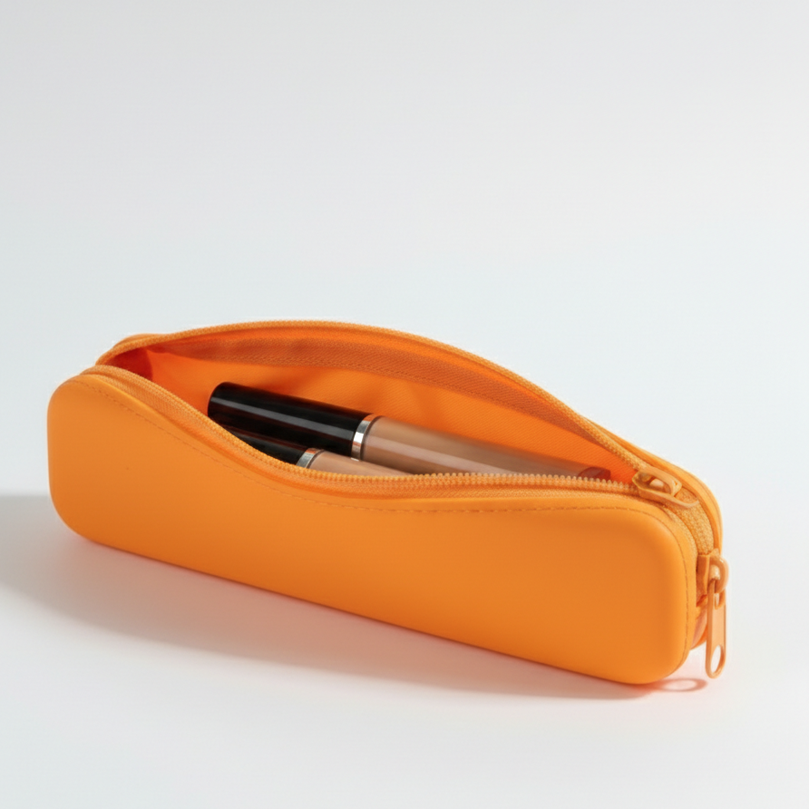 Vibrant orange makeup bag with makeup